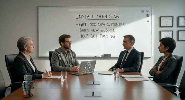 Guy in boardroom with laptop sticker visible